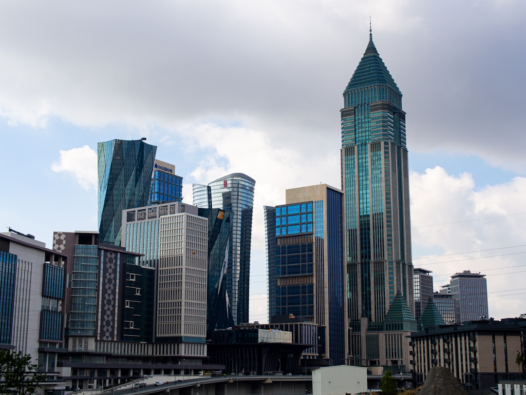 Modern skyscrapers against a cloudy sky