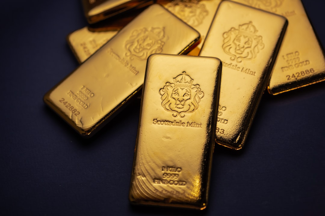 A pile of gold bars sitting on top of a table