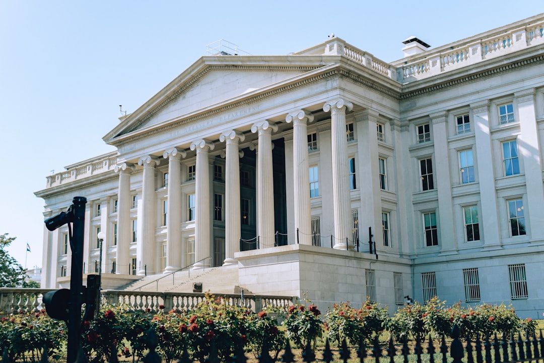 The image shows the united states treasury building.