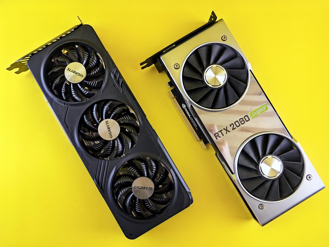 Two computer graphics cards on a yellow background