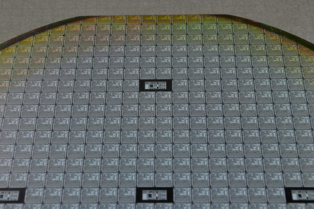 a close up of a metal plate with squares on it
