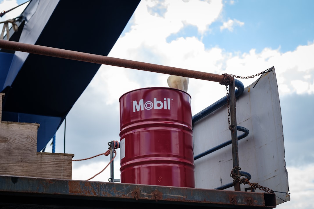 A large red barrel sitting on top of a truck