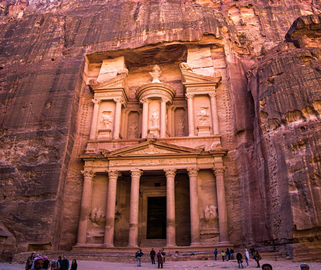 a group of people standing in front of a building