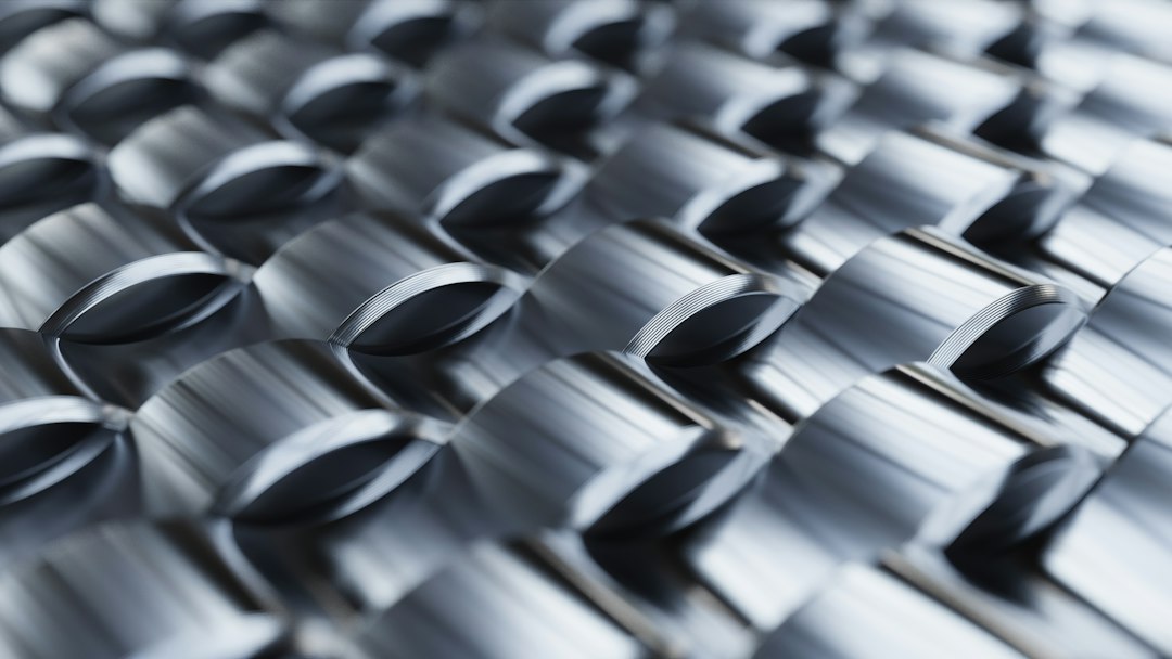 Abstract metallic pattern with repeating geometric shapes