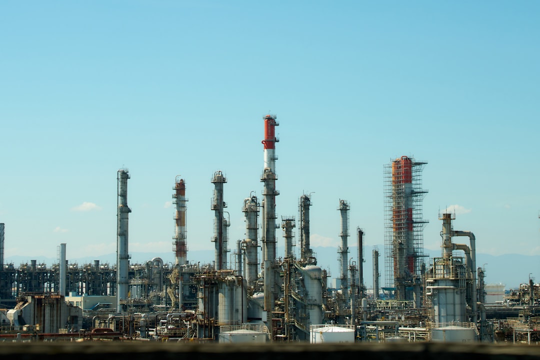 A factory with a lot of pipes and buildings
