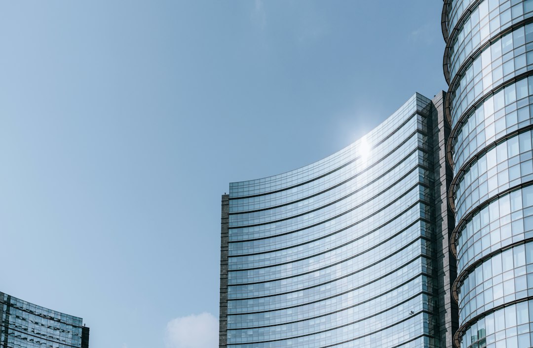 a very tall building next to a very tall building