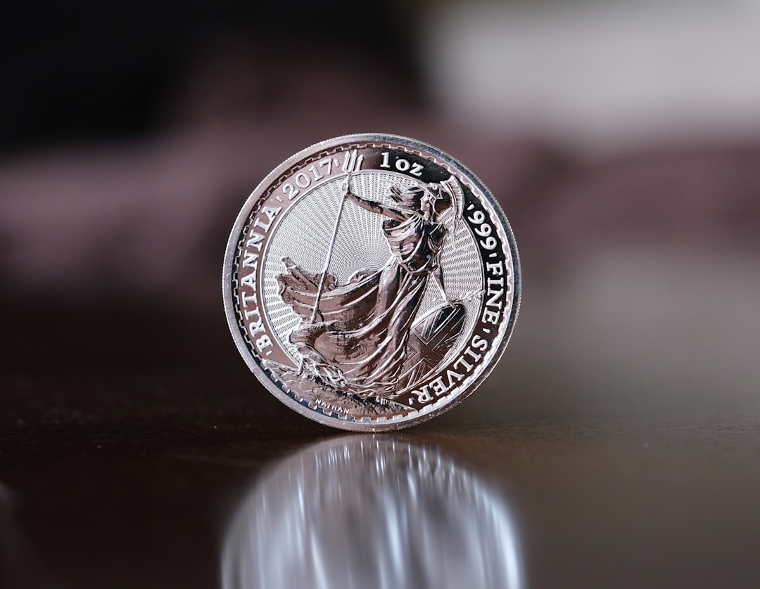 a close up of a coin on a table