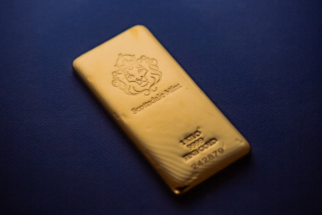 A gold bar sitting on top of a blue table