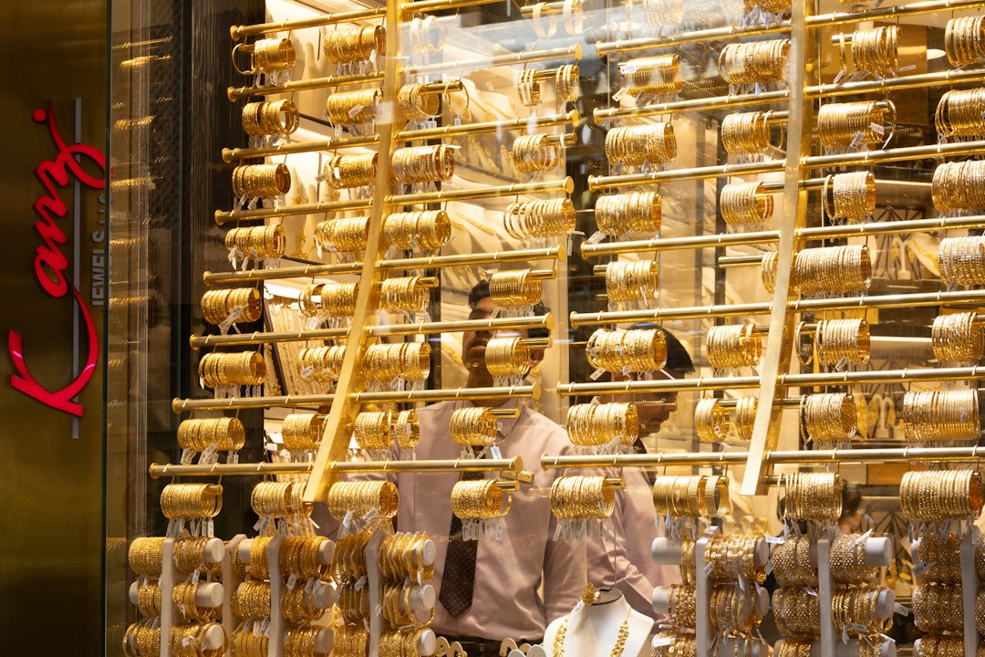 Display of numerous gold bracelets in a jewelry store