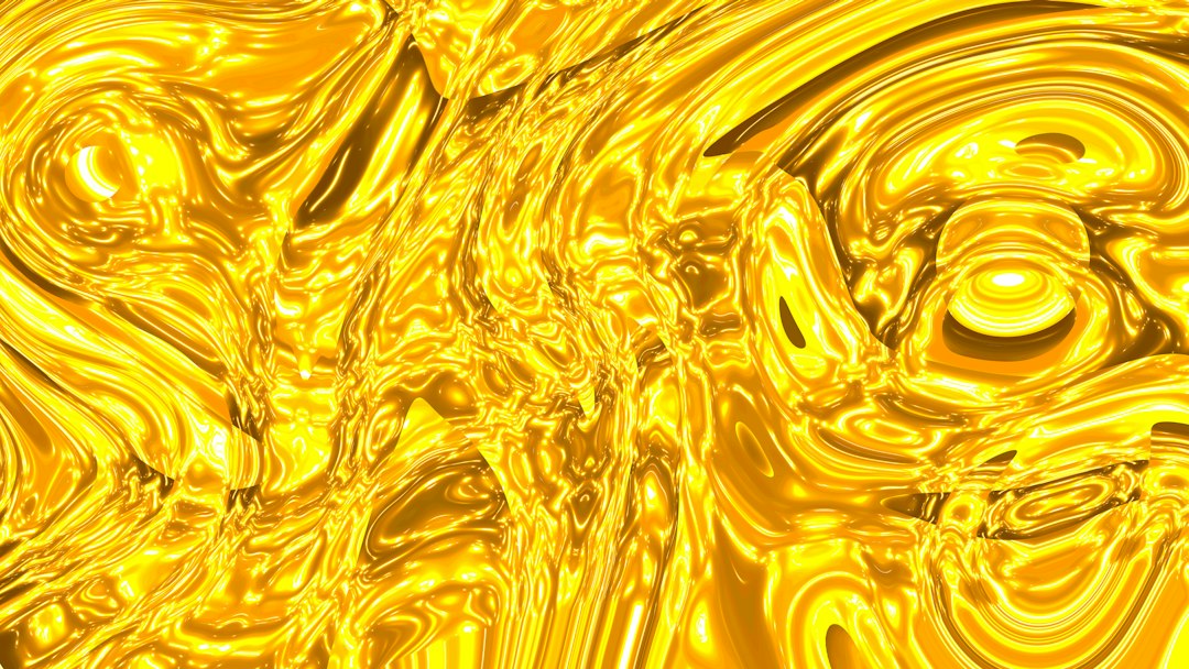 Abstract swirling golden liquid texture