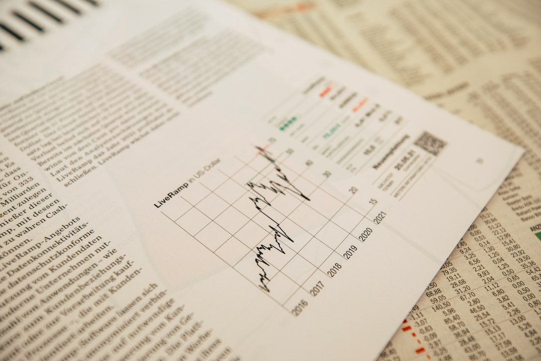 financial newspaper with stock chart