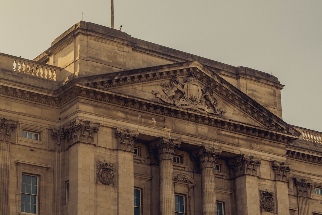 A large building with a flag on top of it