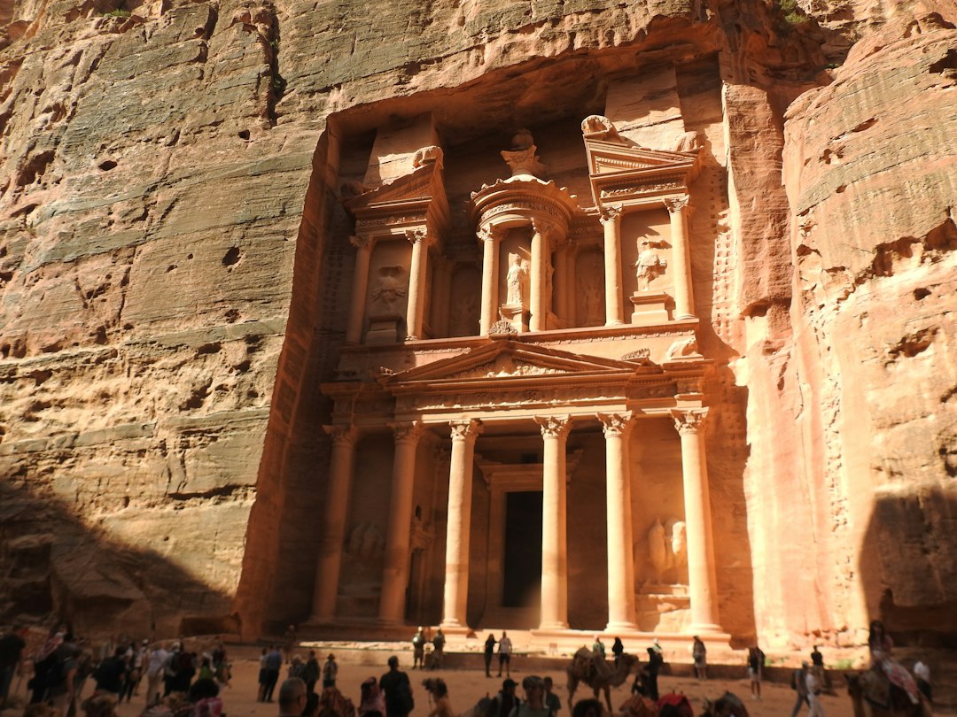 a group of people standing in front of a building