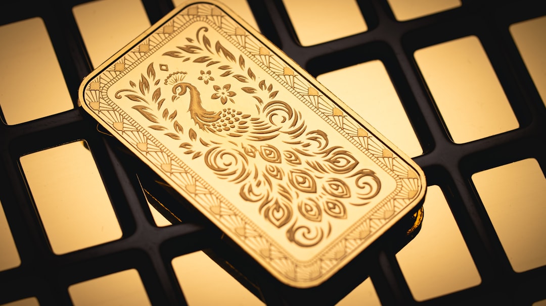 A gold plate sitting on top of a table