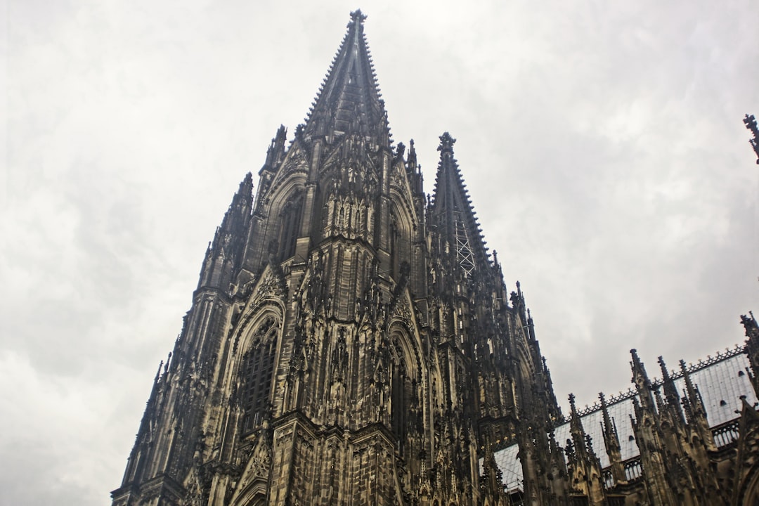 gray concrete building under white sky during daytime