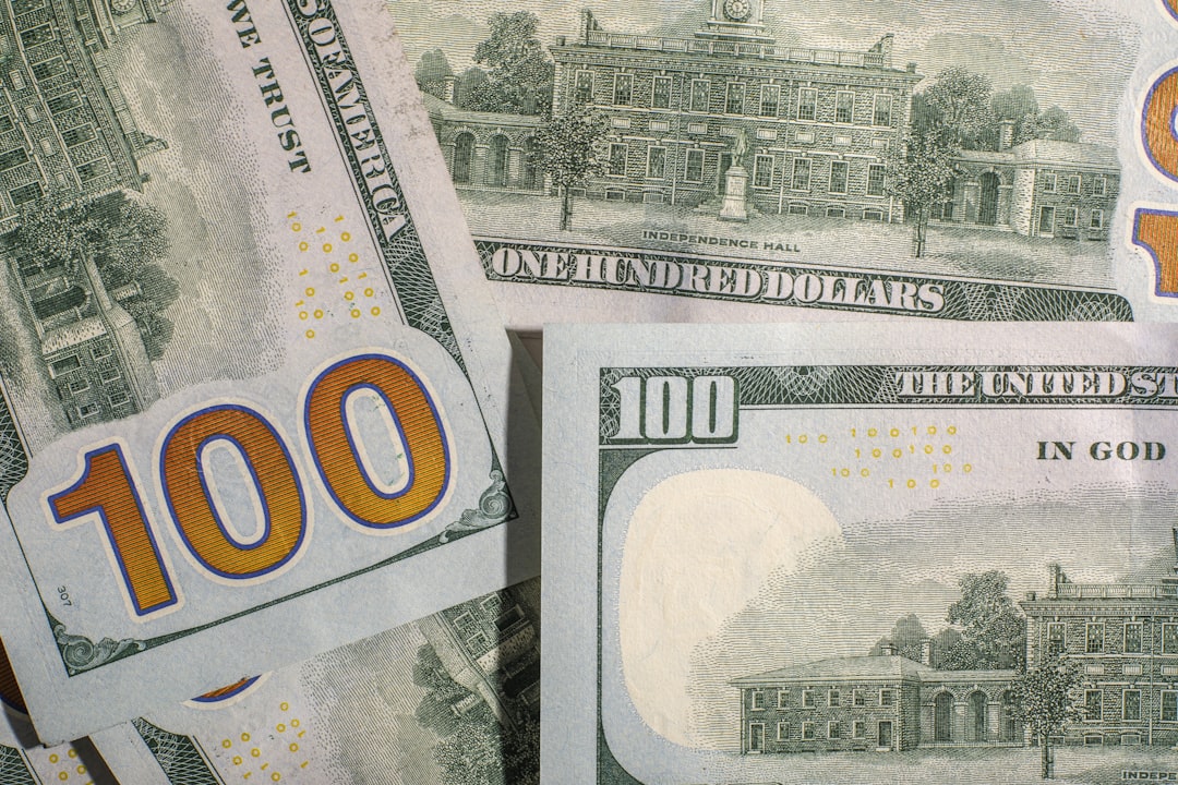 Close-up of united states one hundred dollar bills.