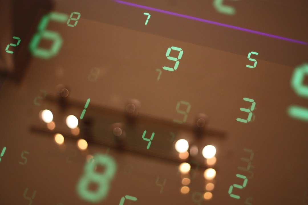 Numbers are reflected on a surface, blurring the image.