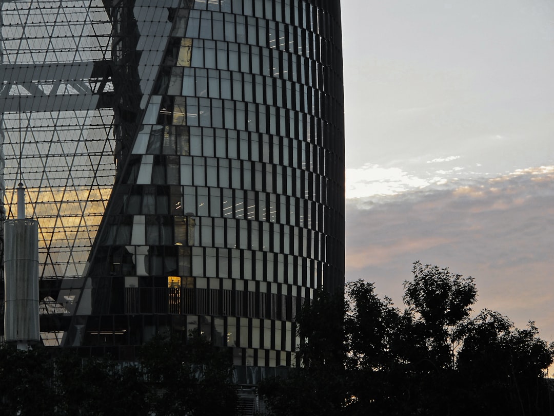 a very tall building with a clock on it's side